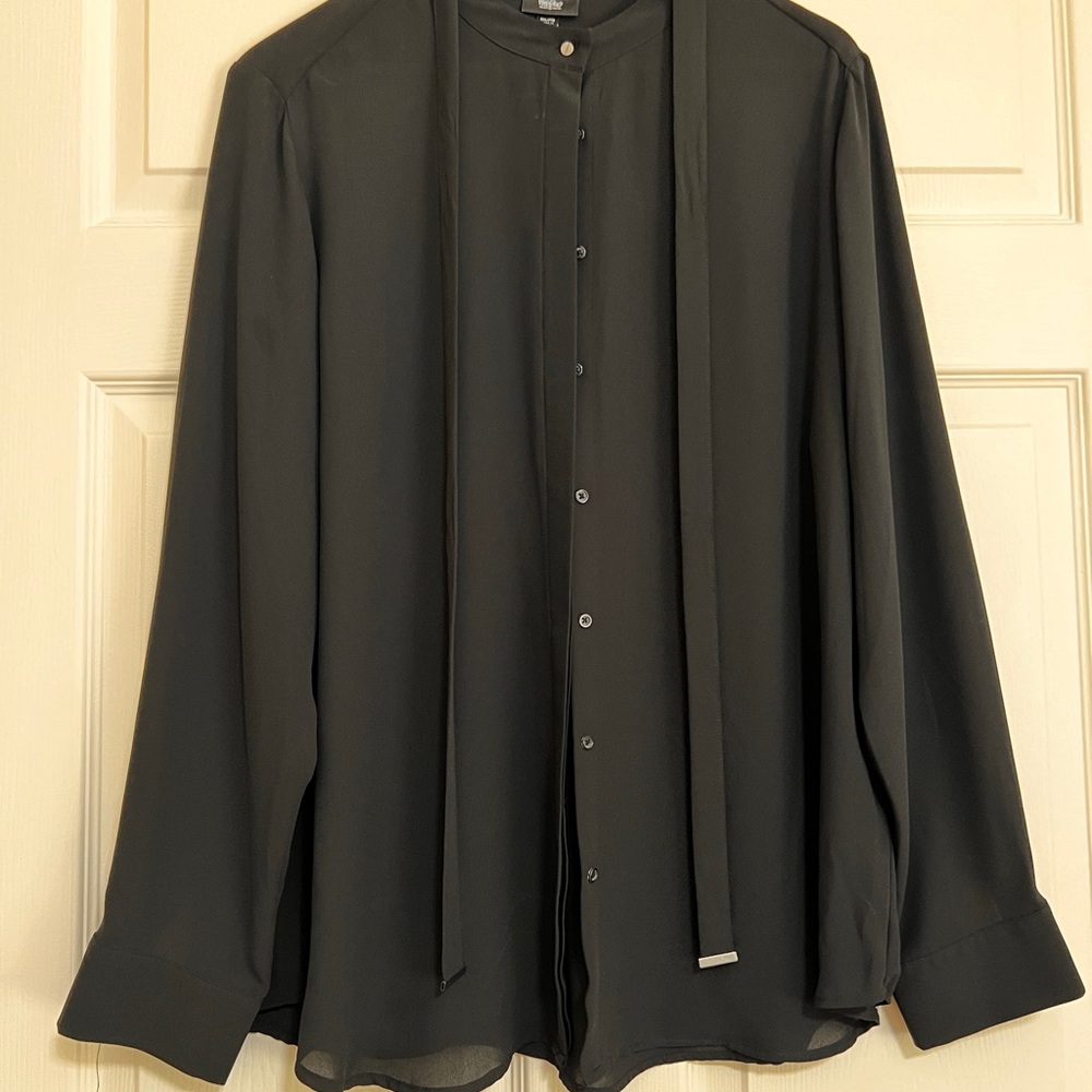 Lovely, lightweight blouse with accent details. Worn once! Like new.